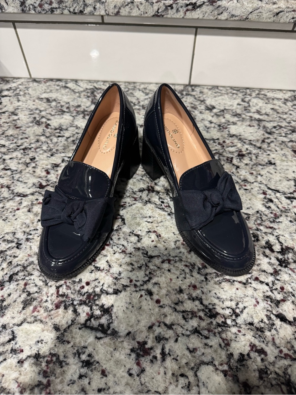 Bandolino women's bow block-heel loafers, specifically in the "Navy” color